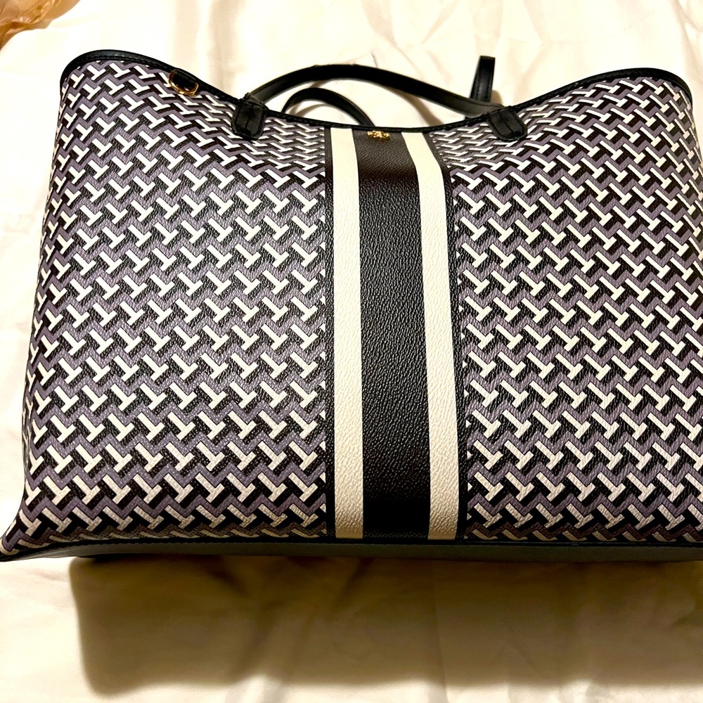 Tory Burch large tote with matching wallet.